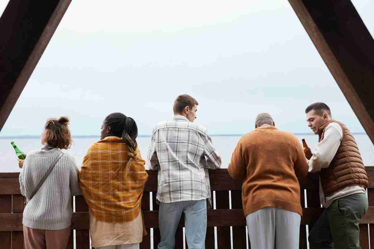 Airbnb extra guest fee people on the balcony